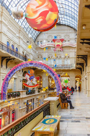 Moscow, Russia - November 21, 2019: Decorated interior of GUM State Department Store on Red square by Christmas decorations. GUM is a popular touristic place in Moscow downtownのeditorial素材