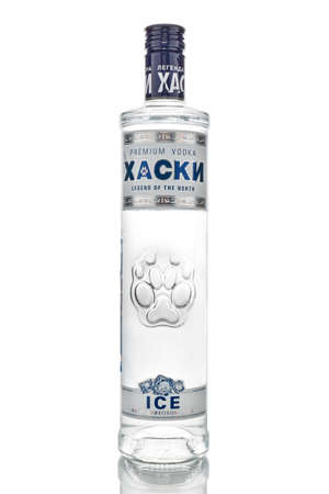 Moscow, Russia - December 25, 2019: Husky Ice russian premium vodka in transparent glass bottle isolated on white backgroundのeditorial素材