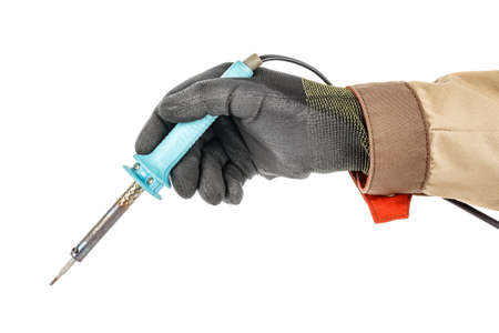 Electrician hand in black protective glove and brown uniform holding soldering iron isolated on...