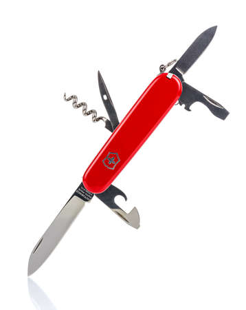 Moscow, Russia - May 15, 2020: Classical red Victorinox swiss pocket foldable knife with open tools isolated on white backgroundのeditorial素材