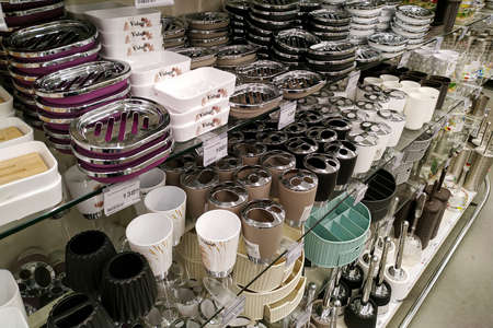 Moscow, Russia - August 17, 2019: Various bathroom accessories on the rack in a building materials...