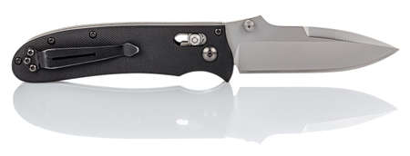 Side view of open folding pocket knife with satin blade and black composite plastic cover plates on...