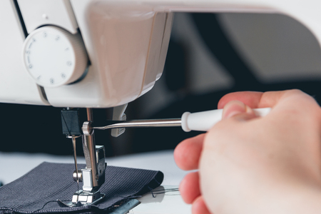 sewing machine and item of clothing. close upの写真素材