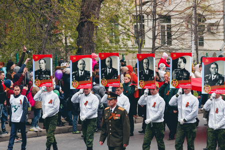 TOMSK, RUSSIA - MAY 9, 2016:  Procession of people in Immortal Regiment on annual Victory Day, May, 9, 2016 in Tomsk, Russiaのeditorial素材