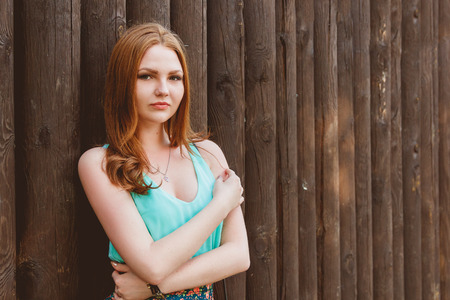 Beauty Girl Outdoors Enjoying Nature. Beautiful Teenage Model Girl with Long Hair, Free Happy Woman....