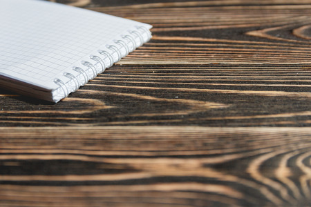 Close up Open Blank Note Book on Grunge Wood. Education Concept