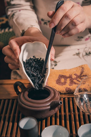 Chinese tea ceremony is performed by tea masterの写真素材