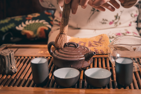 Chinese tea ceremony is performed by tea masterの写真素材