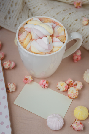Good morning with hot chocolate on wooden tableの写真素材