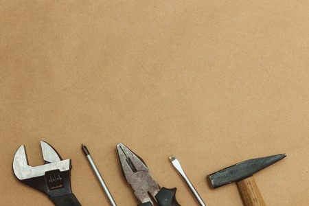 Authentic worn various tools on border with copyspace. flat lay. top view.