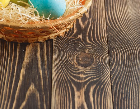 Easter eggs on wooden background with copyspaceの写真素材