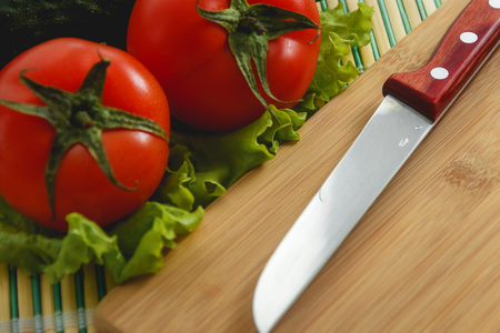 Tomato, vegetable and salad on white backgroundの写真素材