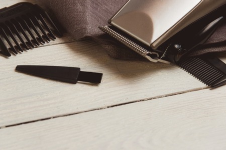 Stylish Professional Hair Clippers, accessories on wood background copy spaceの写真素材