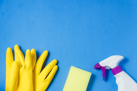 Cleaning Products. Home Cleaning Concept. Blue Background. Place for Typography and Logo. Copy space. Flat Lay Top Viewの写真素材