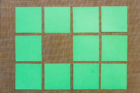 Stationary, Blank Green Sticker on Brown Board. Flat Lay. Top View. Time-management, Planning.の写真素材