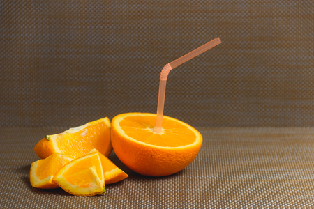 Sliced Orange and Juice Drink on Dark Background. Healthy Concept.の写真素材