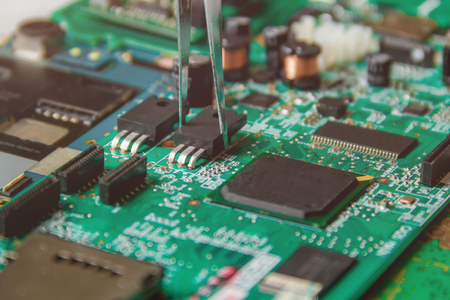Printed Circuit Board with many electrical components.