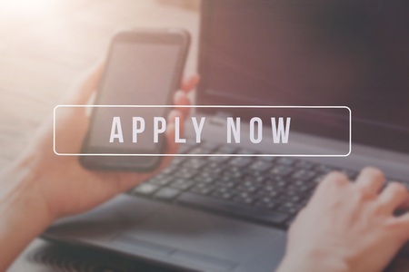 Recruiter advertising for job vacancies, searching candidates to hire for business opportunities.の写真素材