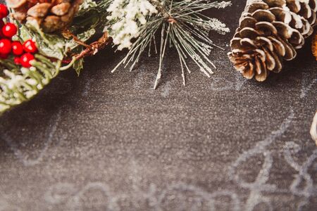 Christmas card concept with holiday decor on grey concrete background with copy spaceの写真素材