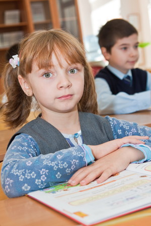 Elementary school. Schoolgirl with a bookの写真素材