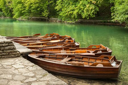 Wooden boats for hire for tourists in Plitvice Lakes National Park. Croatiaの写真素材
