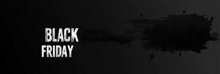 Black Friday text written on the left on black background with spot. Banner for seasonal sale in November in storeの素材
