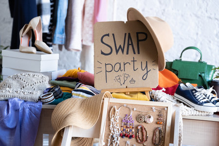 Swap Party invitation poster with stylized lettering and style decoration. Event for exchange of clothes, shoes and accessories. Reduce and reuse concept. Idea of exchange your old wardrobe for newの写真素材