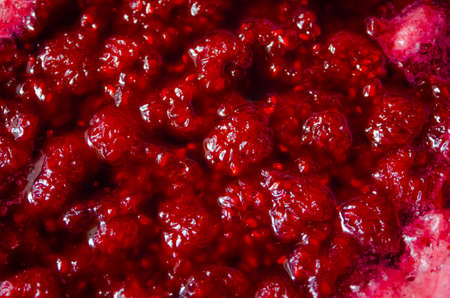 Texture of red raspberry jam food theme backgroundの写真素材
