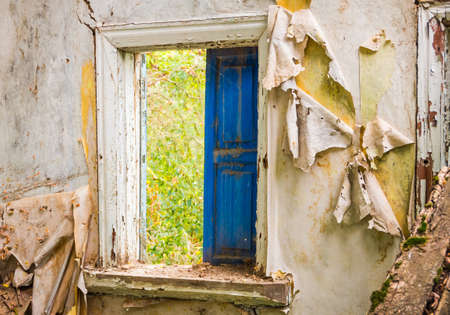 window of the old abandoned house in the summer