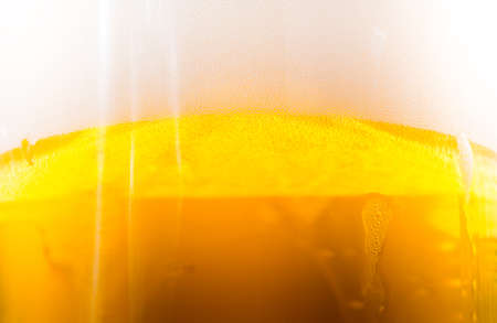 background delicious cold beer in a glass of barleyの写真素材