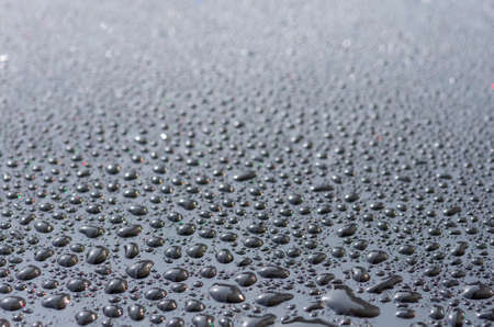 drops on the glass surface of the matrix TFT monitor closely, backgroundの写真素材