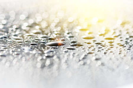 drops on the glass surface of the matrix TFT monitor closely, backgroundの写真素材