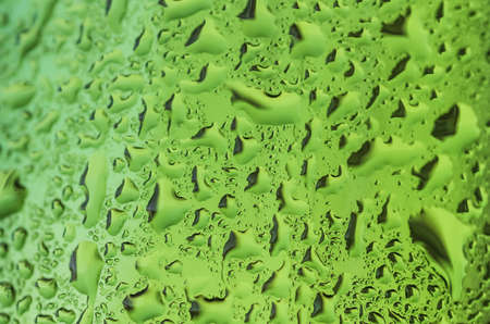 Texture water drops on the bottle of beer.の写真素材