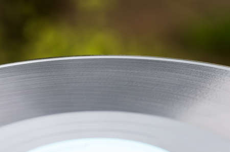 Old vinyl records close to the natural backgroundの写真素材