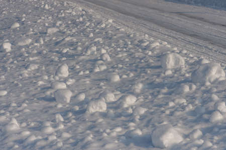 Clumps of the fresh fluffy snow fell on Christmas Eve. Natural winter backgroundの写真素材