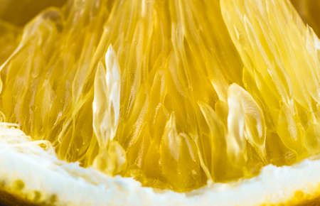 Ripe juicy orange shot very close, backgroundの写真素材