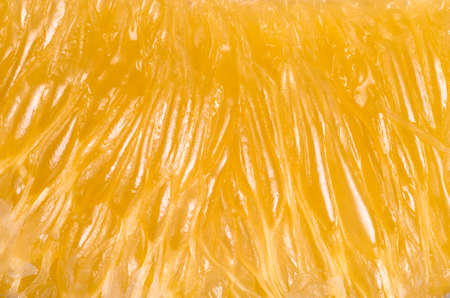 Ripe juicy orange shot very close, backgroundの写真素材