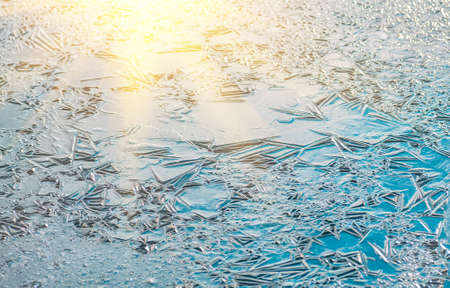 Texture, patterns on pond ice on Christmas Eve. Winter backgroundの写真素材