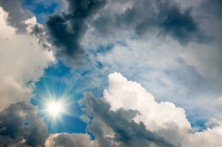 large dark clouds and sun before a storm, natural background