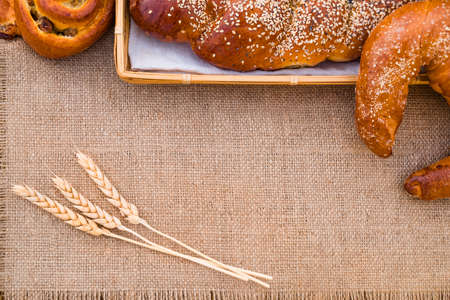 Bakery products lying on a tablecloth, closeupの写真素材