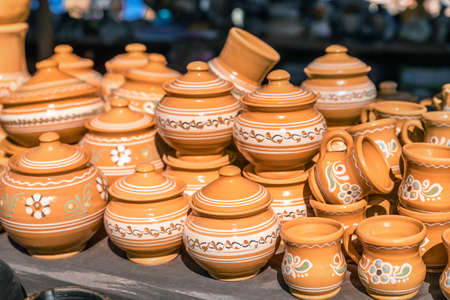 Clay dishes. Crockery made of clay. Ceramic national Ukrainian dishes made in the Poltava region in...