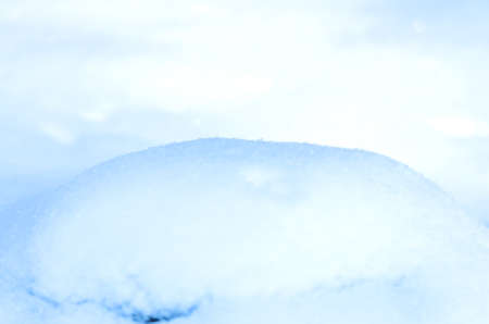 Beautiful fresh snow pattern in minimalistic style. Winter background. Close up texture.