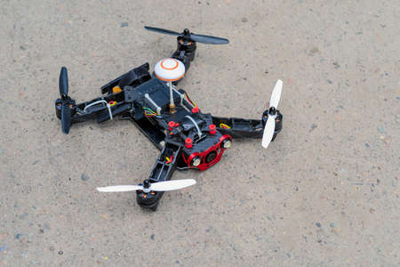 Dron, quad rocopter landed on asphalt close up.の写真素材