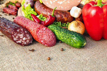 Meat food and vegetables are lying on the table closeup. Food Backgroundの写真素材