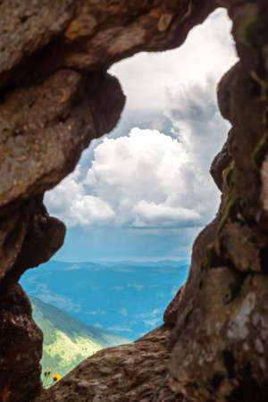 hurricane over the mountains view through crevicesの写真素材