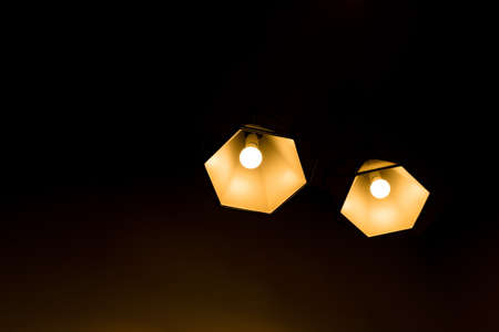 Two pendant lamps hanging on ceiling. Contemporary Design.