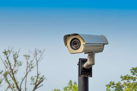 CCTV security camera installed in the park.の写真素材