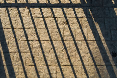 Shadow on the old wall texture of buildingの写真素材
