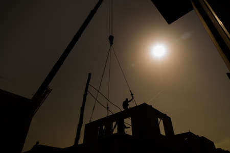 Silhouette background, Building activity in prefabricated system.の写真素材