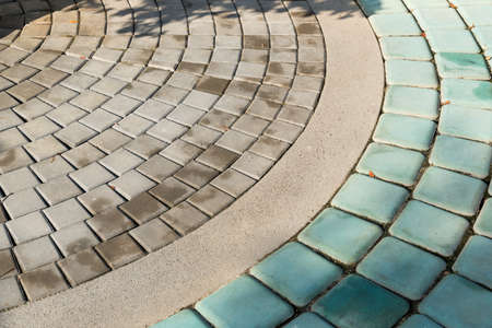 Pattern of cement brick floor in the public park.